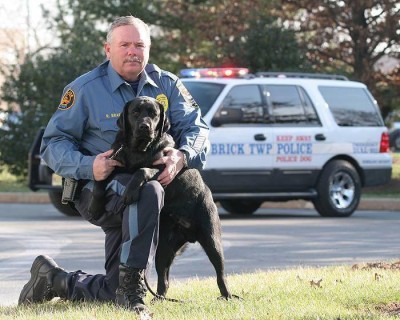 Brick police officer Ron Braen and Eros, a K9 who died Friday. (Photo: NJSPCA)