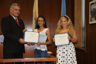 From left to right: Freeholder Director Joseph H. Vicari, who serves as liaison to the county vo-tech schools, and scholarship winners Arely Aguirre, Brick Township, and Amanda Menth, Toms River