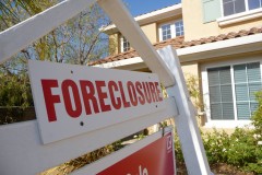 A foreclosure sign in front of a home. (Credit: Jeff Turner/Flickr)