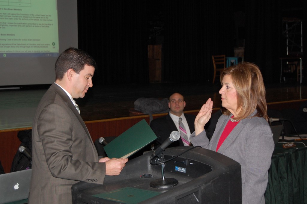 Sharon Cantillo is sworn in by Business Administrator James Edwards as Brick BOE President. (Photo: Daniel Nee)