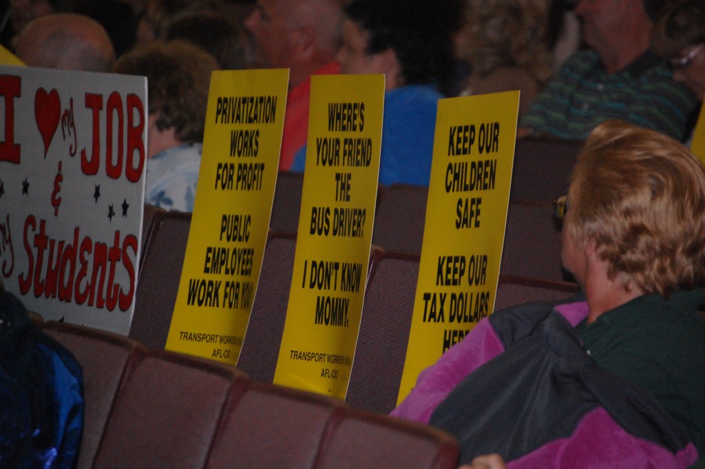 Protest signs carried into a Board of Education meeting by Brick Township bus drivers. (Photo: Daniel Nee)
