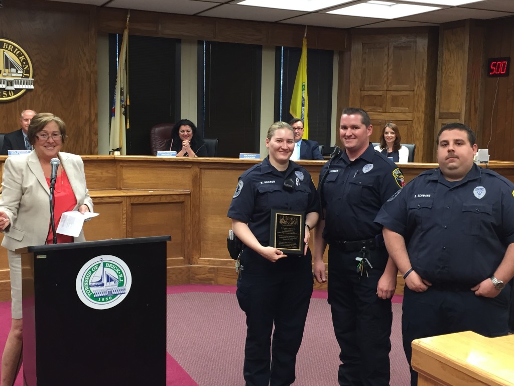 Brick Police EMTs recognized by Carol Wolfe for their efforts in a Jan. 2015 apartment fire. (Photo: Daniel Nee)
