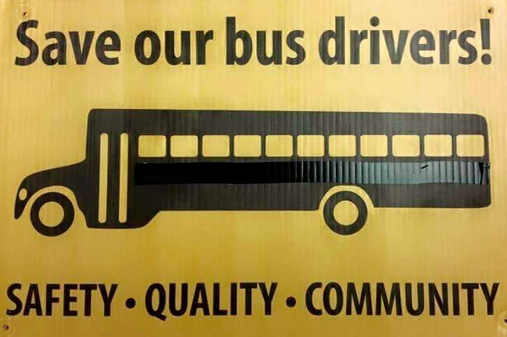 A sign opposes a plan to cut 31 full-time bus driver positions in Brick. (Supplied Photo)