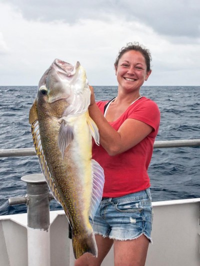 A customer on board the Voyager party boat shows off her tilefish this week. (Photo: Voyager)