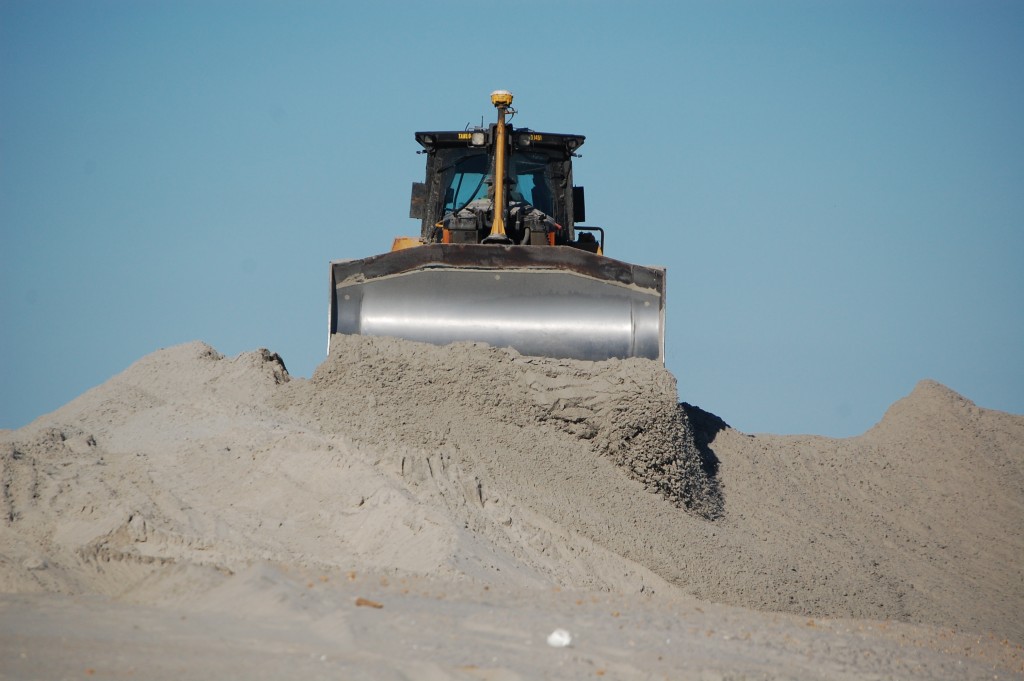 Crews move sand in a beach and dune replenishment project in Long Beach Township, Oct. 15, 2015. (Photo: Daniel Nee)