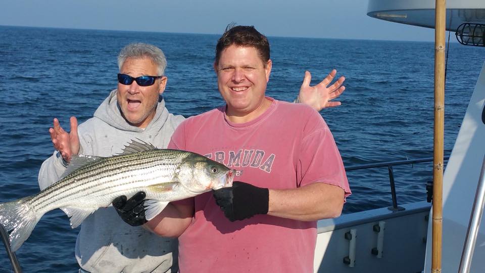 Customers on board the Queen Mary out of Point Pleasant Beach hooked up with stripers and blues this week. (Photo: Queen Mary)