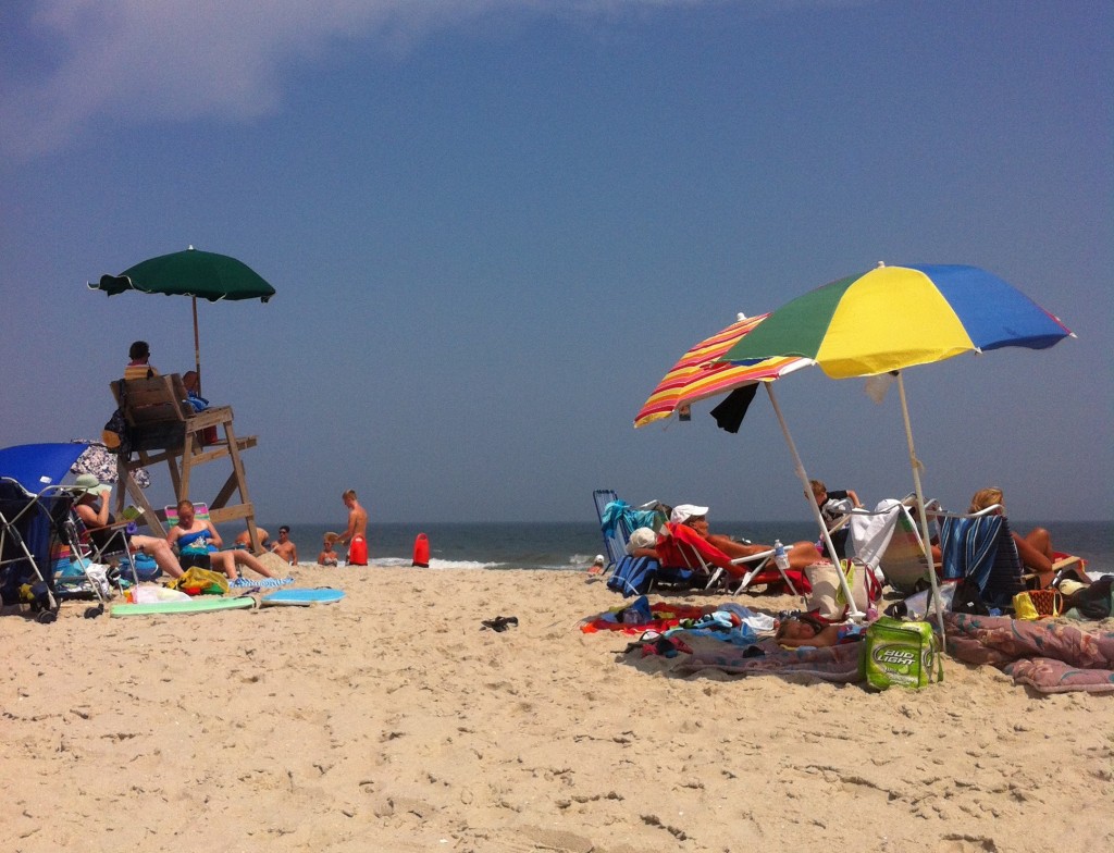 Beachgoers relax during a sunny summer day. (Photo: Daniel Nee)