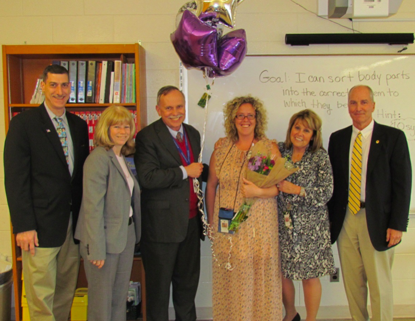 District officials present Jeannette Wehner with the 2016 Teacher of the Year award. (Photo: Brick Twp. Schools)