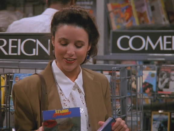 Elaine Benes, a Seinfeld character, browses for movies in a 1997 episode of the sitcom. (Credit: NBC)