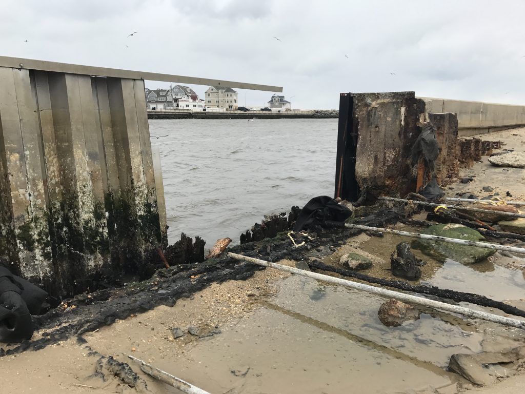 A hole in the bulkhead on the Point Pleasant side of Manasquan Inlet. (Photo: Daniel Nee)