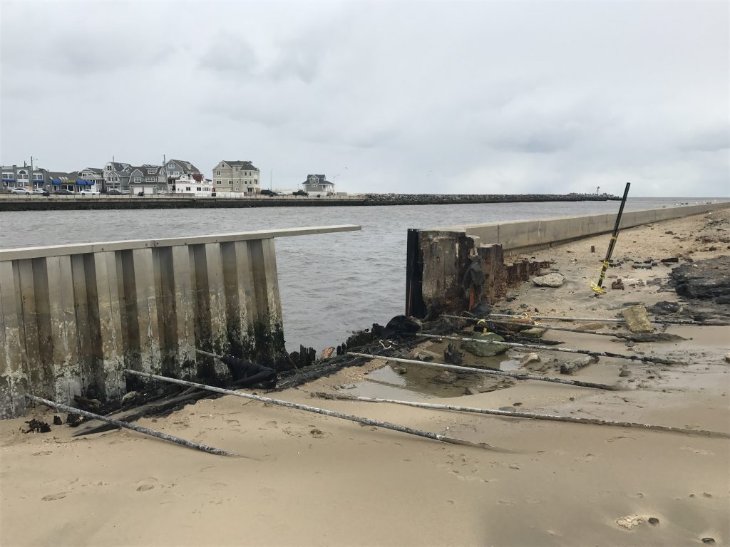 A hole in the bulkhead on the Point Pleasant side of Manasquan Inlet. (Photo: Daniel Nee)