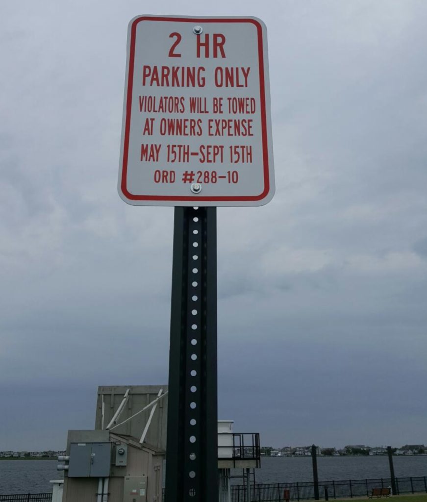 A sign showing parking regulations at Traders Cove Marina and Park. (Credit: Jim Fozman)