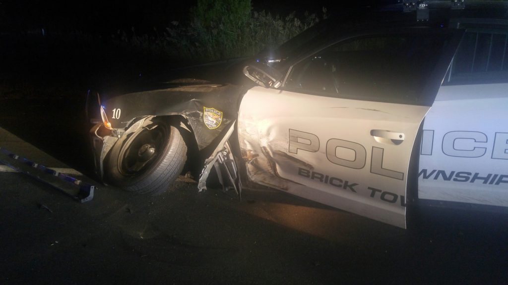 A Brick police car struck with an officer inside. (Photo: Brick Twp. Police)