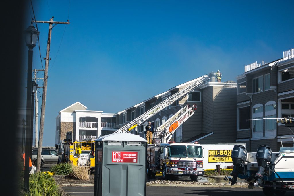 Firefighters respond to a four-alarm blaze at the Ocean Club condominium on Route 35 in Brick. (Photo: Daniel Nee)