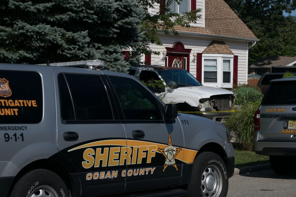 Ocean County Sheriff's Department vehicles outside the site of a suspected homicide in Brick. (Photo: Daniel Nee)