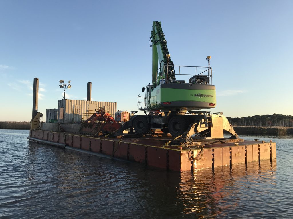 A dredge barge rests in the narrows of the Metedeconk River on Oct. 16, 2019. (Photo: Daniel Nee)