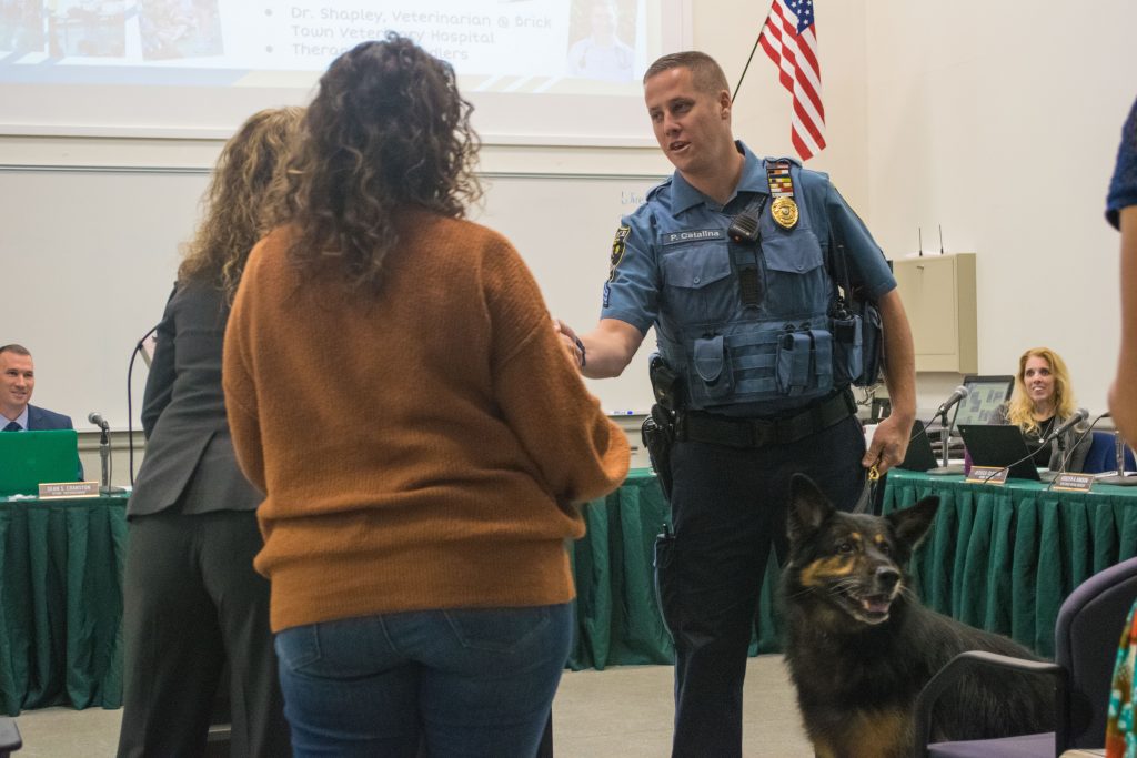Sgt. Paul Catalina and K9 Duke receive an honor from the Brick Twp. Board of Education, Oct. 2019. (Photo: Daniel Nee)
