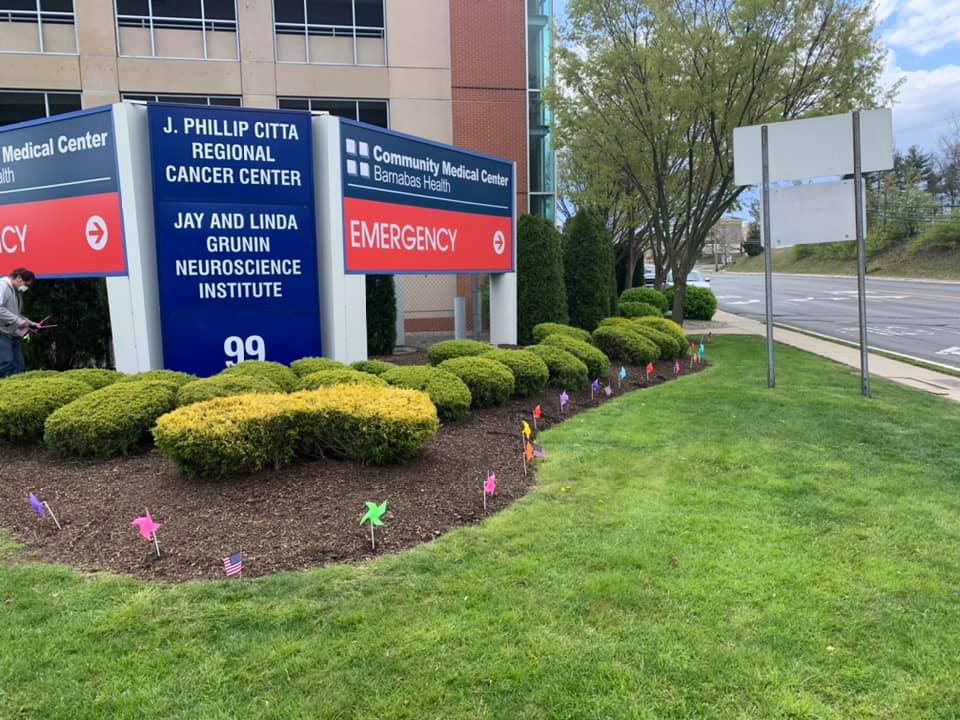 Colorful pinwheels and flags displayed at Ocean Medical Center and Community Medical Center, organized by local resident Frank Peppi. (Photo: Frank Peppi)