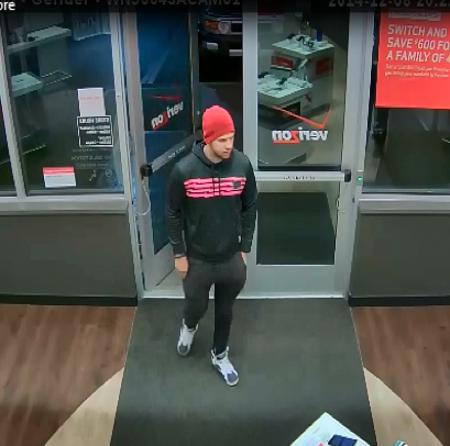 A suspect accused of passing counterfeit $100 bills at a Brick Verizon store. (Photo: Brick Twp. Police)