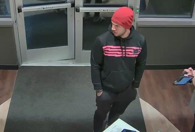A suspect accused of passing counterfeit $100 bills at a Brick Verizon store. (Photo: Brick Twp. Police)