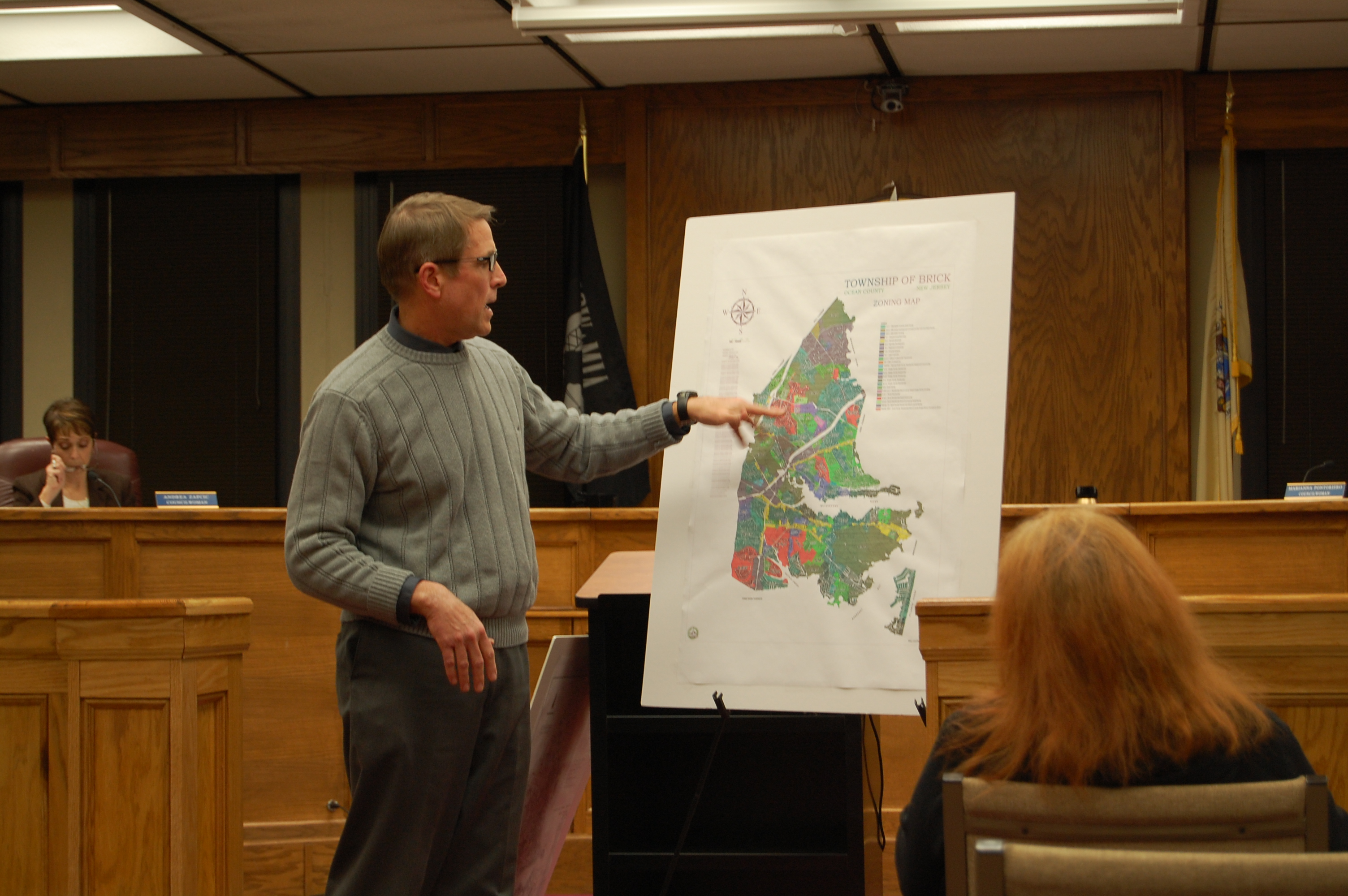 Township Planner Mike Fowlers shows off a display of the new color zoning maps. (Photo: Daniel Nee)