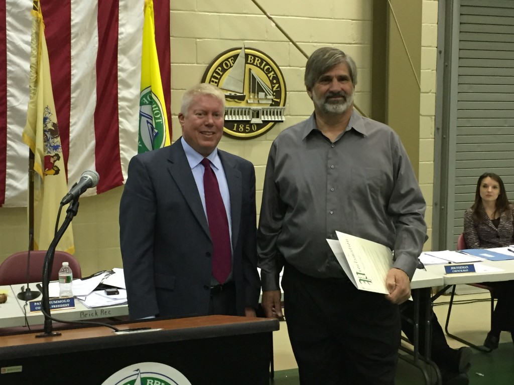 John Koester receives recognition from Mayor John Ducey. (Photo: Daniel Nee)