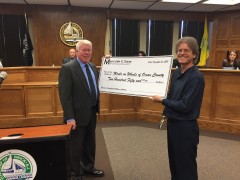 Mayor John Ducey donates a check to Ocean County Meals on Wheels. (Photo: Daniel Nee)