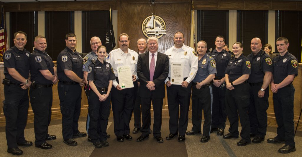 Brick Police EMS members are honored by Mayor John Ducey and township council members. (Photo: Daniel Nee)
