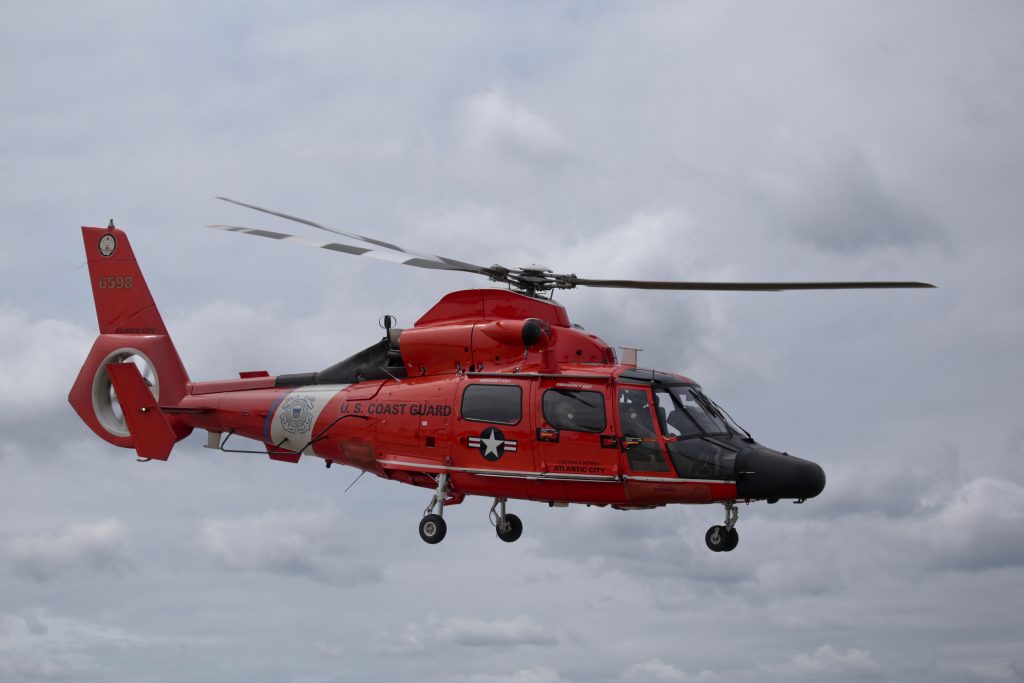 A U.S. Coast Guard HH-65C Dolphin helicopter from Coast Guard Air Station Atlantic City takes off during a three-day Aeropsace Control Alert CrossTell live-fly training exercise at Atlantic City International Airport, N.J., May 24, 2017. (U.S. Air National Guard photo by Master Sgt. Matt Hecht/Released) 
