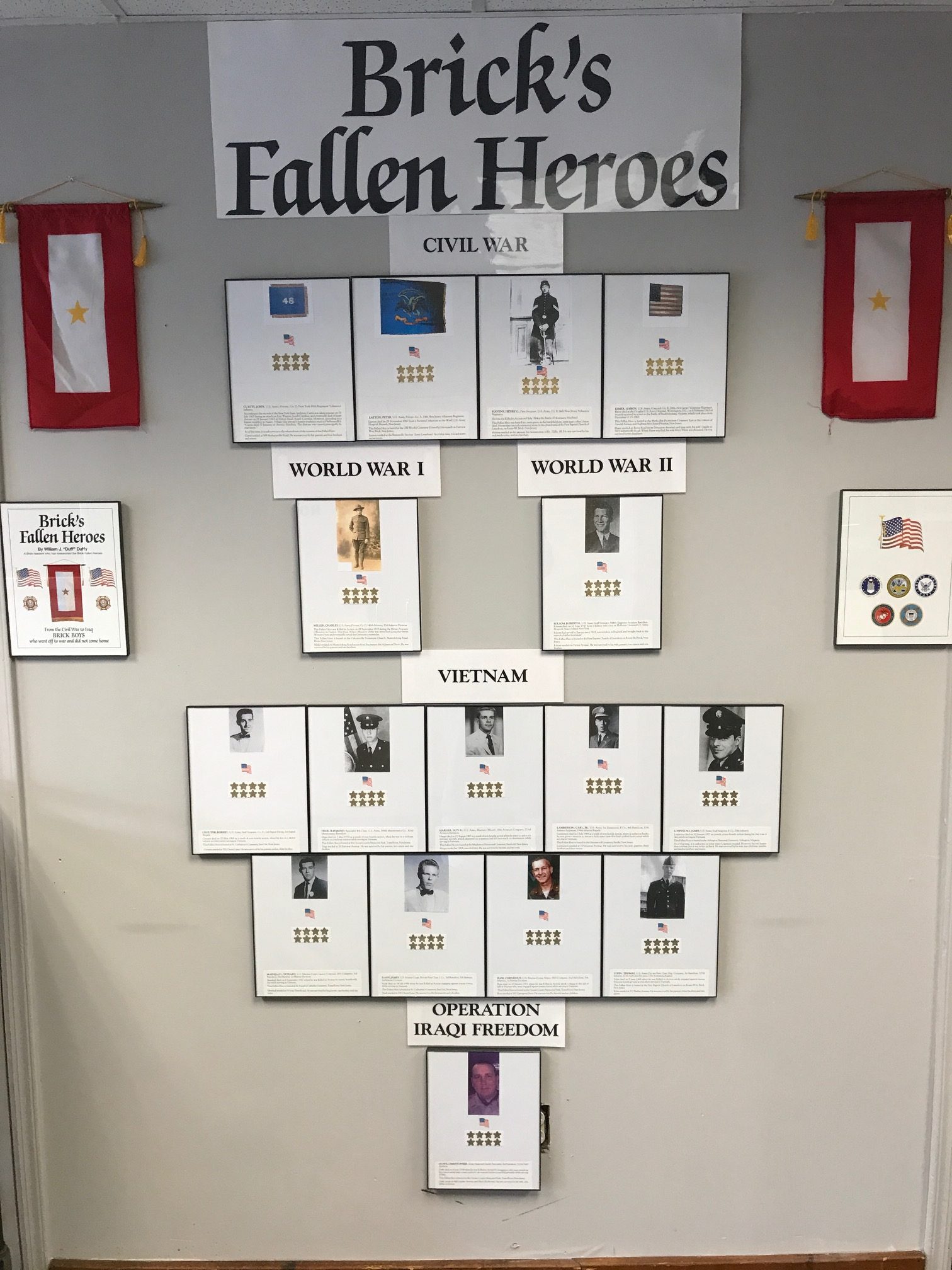 The Fallen Heroes display at the Brick VFW, which will host a special Memorial Day Weekend event sharing the biographies of these soldiers. (Photo by William Duffy)