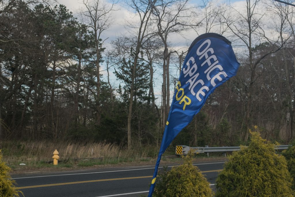 A banner flag advertising office space on Herbertsville Road, April 15, 2019. (Photo: Daniel Nee)