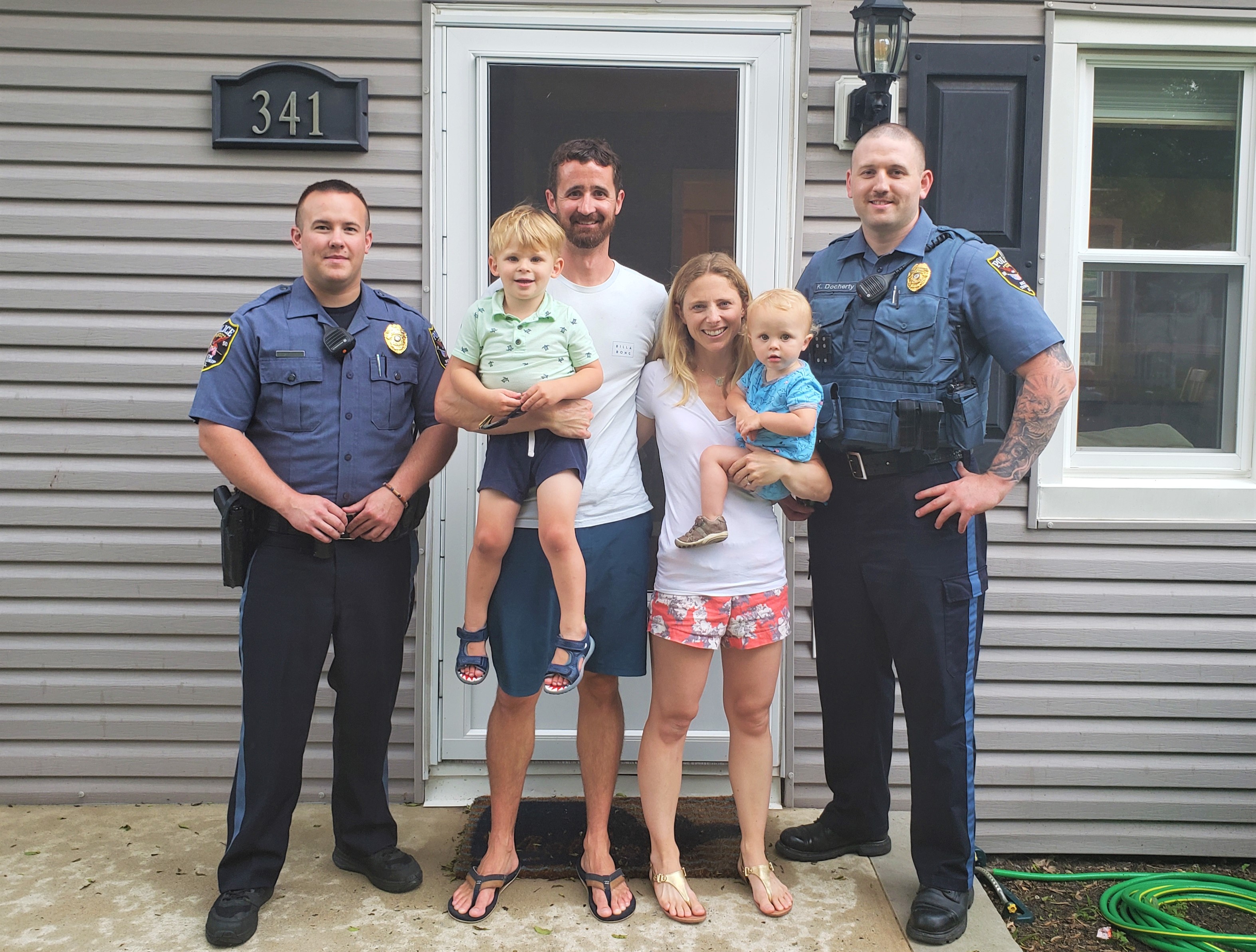 Brick police officers and the Travers family are reunited after their son was saved after choking. (Photo: Brick Twp. Police)