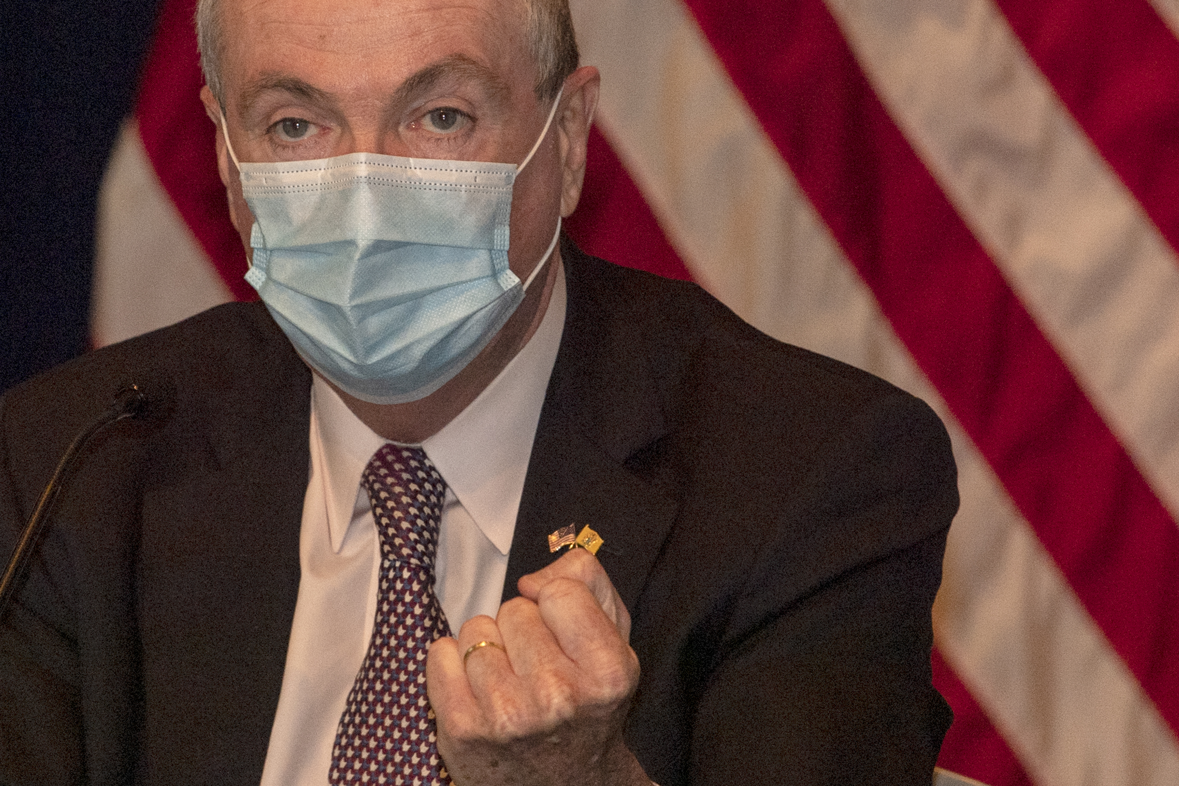 Gov. Phil Murphy, wearing a mask, runs a press briefing in June. (Pool Photo: Jose Moreno, The Philadelphia Inquirer)