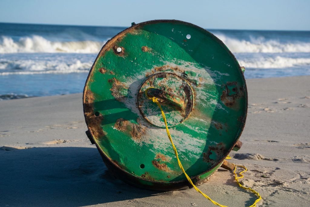 A green lateral buoy washed up on Brick Beach III, Sept. 22, 2020. (Photo: Daniel Nee)