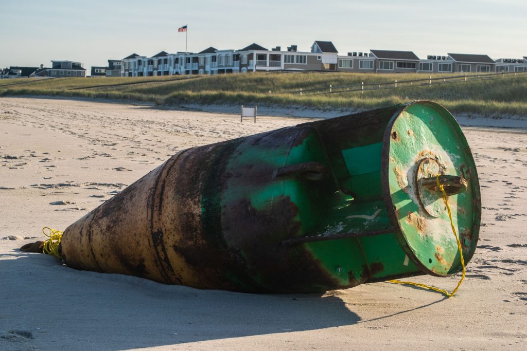 A green lateral buoy washed up on Brick Beach III, Sept. 22, 2020. (Photo: Daniel Nee)