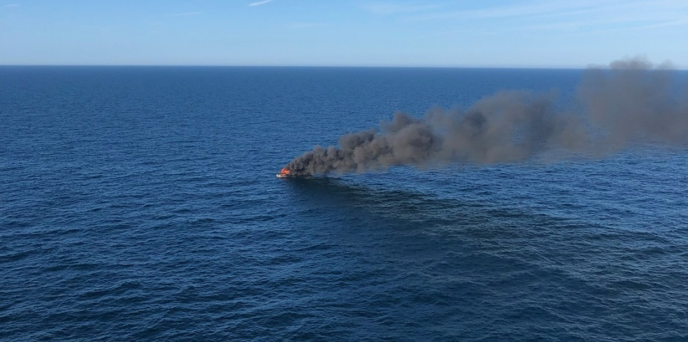 The U.S. Coast Guard rescues anglers from a burning boat off Ocean County, Nov. 5, 2020. (Photo: USCG)
