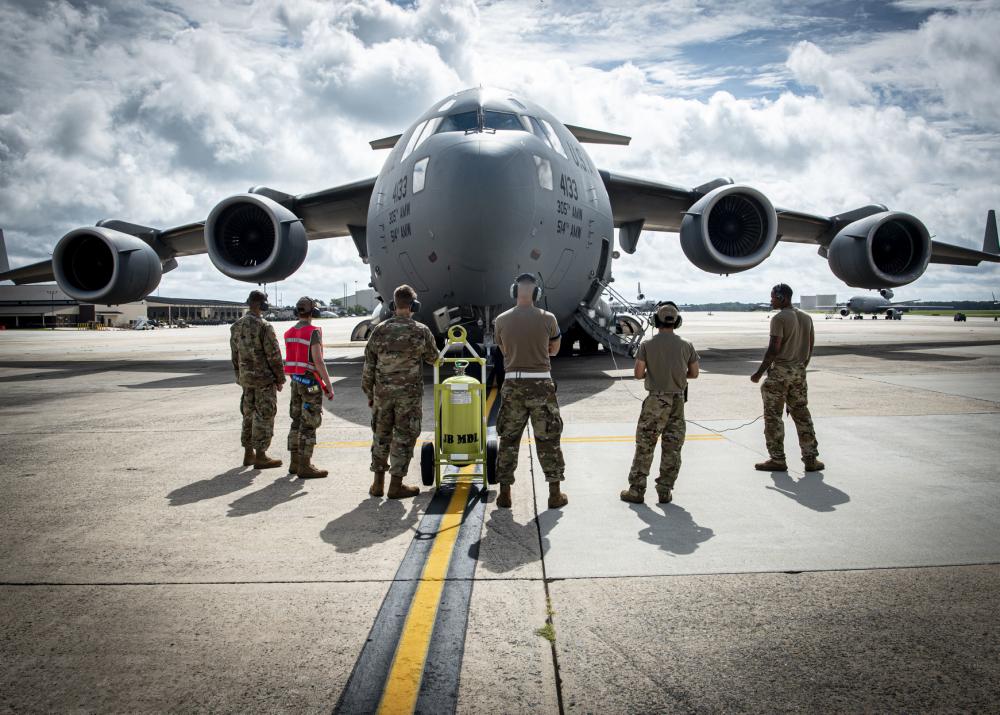 Airmen assigned to the 305th Maintenance Group prepare to launch a C-17 Globemaster III assigned to the 305th Air Mobility Wing at Joint Base McGuire-Dix-Lakehurst, N.J., Aug. 18, 2021. The 305th AMW is responsible for delivering Rapid Global Mobility to the U.S. and its allies throughout the world. The unit’s C-17 fleet was relocated to support operations in Kabul, Afghanistan. (U.S. Air Force photo by Airman 1st Class Azaria E. Foster)