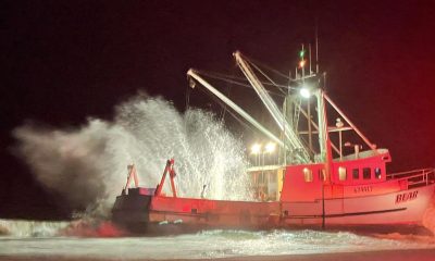A commercial fishing vessel, Bear, grounded at Island Beach State Park, Oct. 10, 2021. (Credit: Seaside Park Fire Dept.)