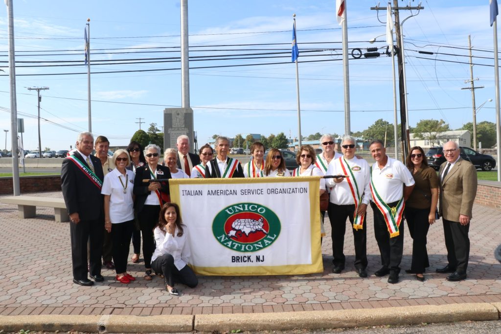 Members of Brick UNICO raise the Italian flag in an annual ceremony, Oct. 8, 2021. (Photo: Brick Township)