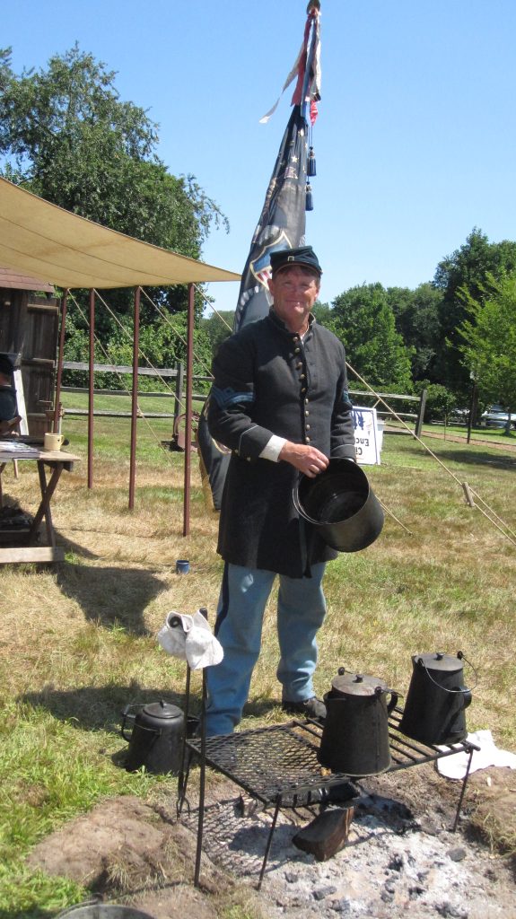 Jim Heine of Brick with camp fire at Havens Homestead property. (Photo: Brick Twp. Historical Society)