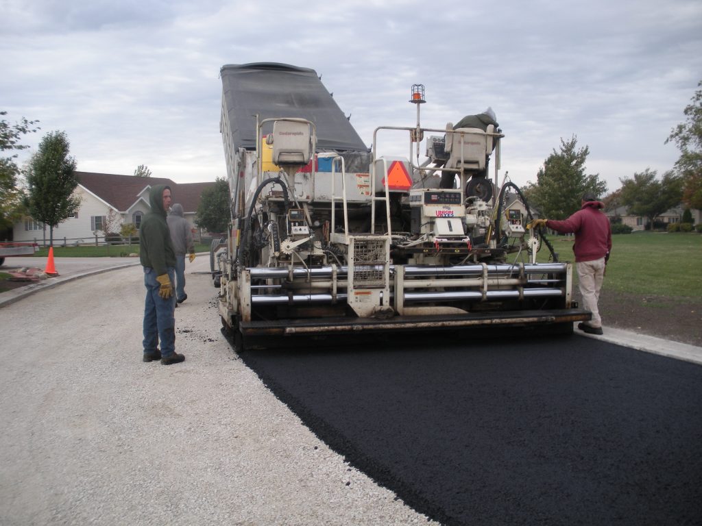 A paving project underway. (Photo: Pam Broviak/ Flickr/ Creative Commons)