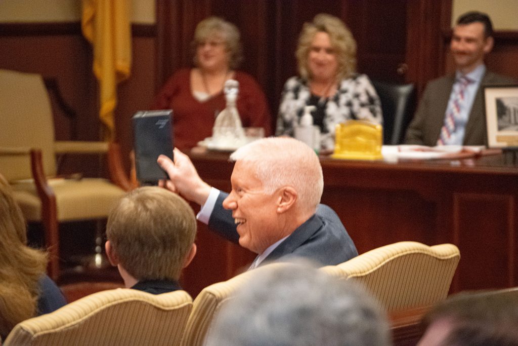 John Ducey shows off his signature 'analogue' calendar at his swearing-in ceremony as a Superior Court judge, March 23, 2023. (Photo: Daniel Nee)