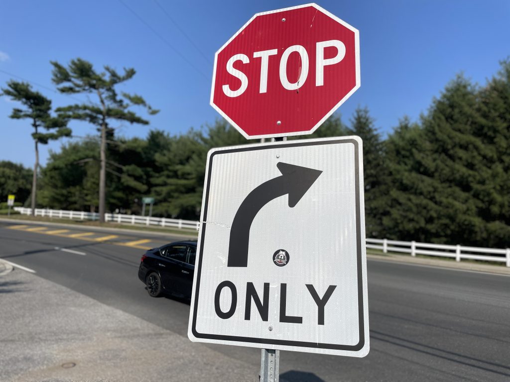 A sign exiting a private business restricts motorists to right turns only. (Photo: Shorebeat)