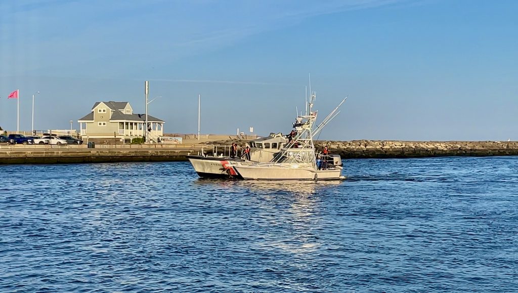 A crew from U.S. Coast Guard Station Manasquan Inlet assists a vessel dead in the water at Manasquan Inlet, Oct. 19, 2023. (Photo: Shorebeat)