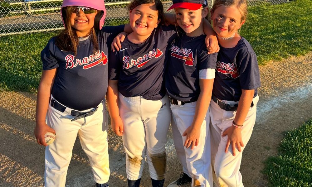 Mayor Lisa Crate joins girls from the Brick Little League program as they begin their season in 2024. (Photo: Brick Little League)