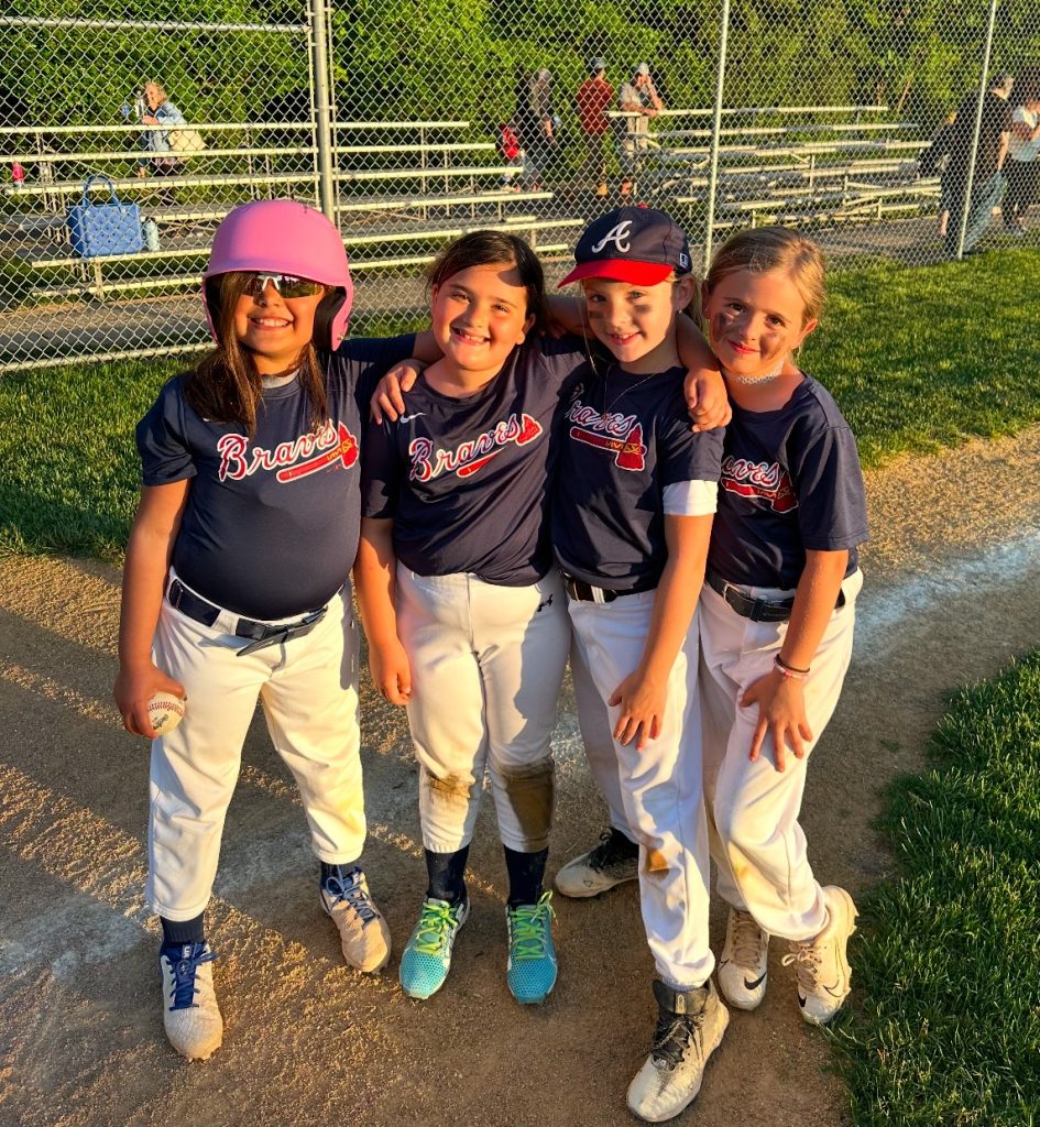 Mayor Lisa Crate joins girls from the Brick Little League program as they begin their season in 2024. (Photo: Brick Little League)